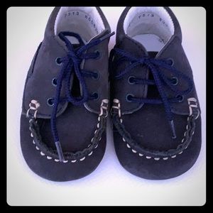 Blue suede baby shoes